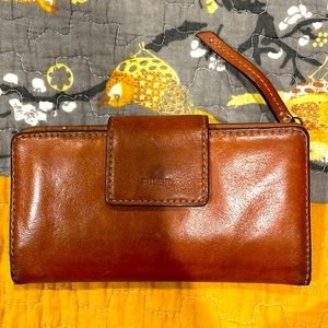 Medium sized, brown leather, Fossil clutch wallet.